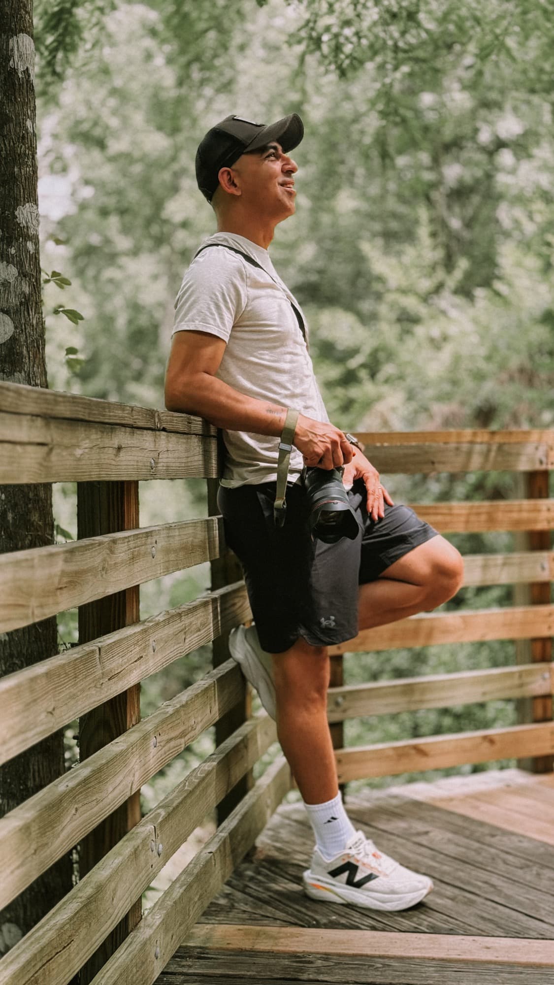 Bruno Ribeiro holding a camera outdoors